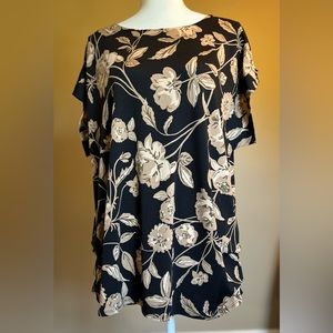 The cure blouse with two toned tan on black floral print. Size XXL